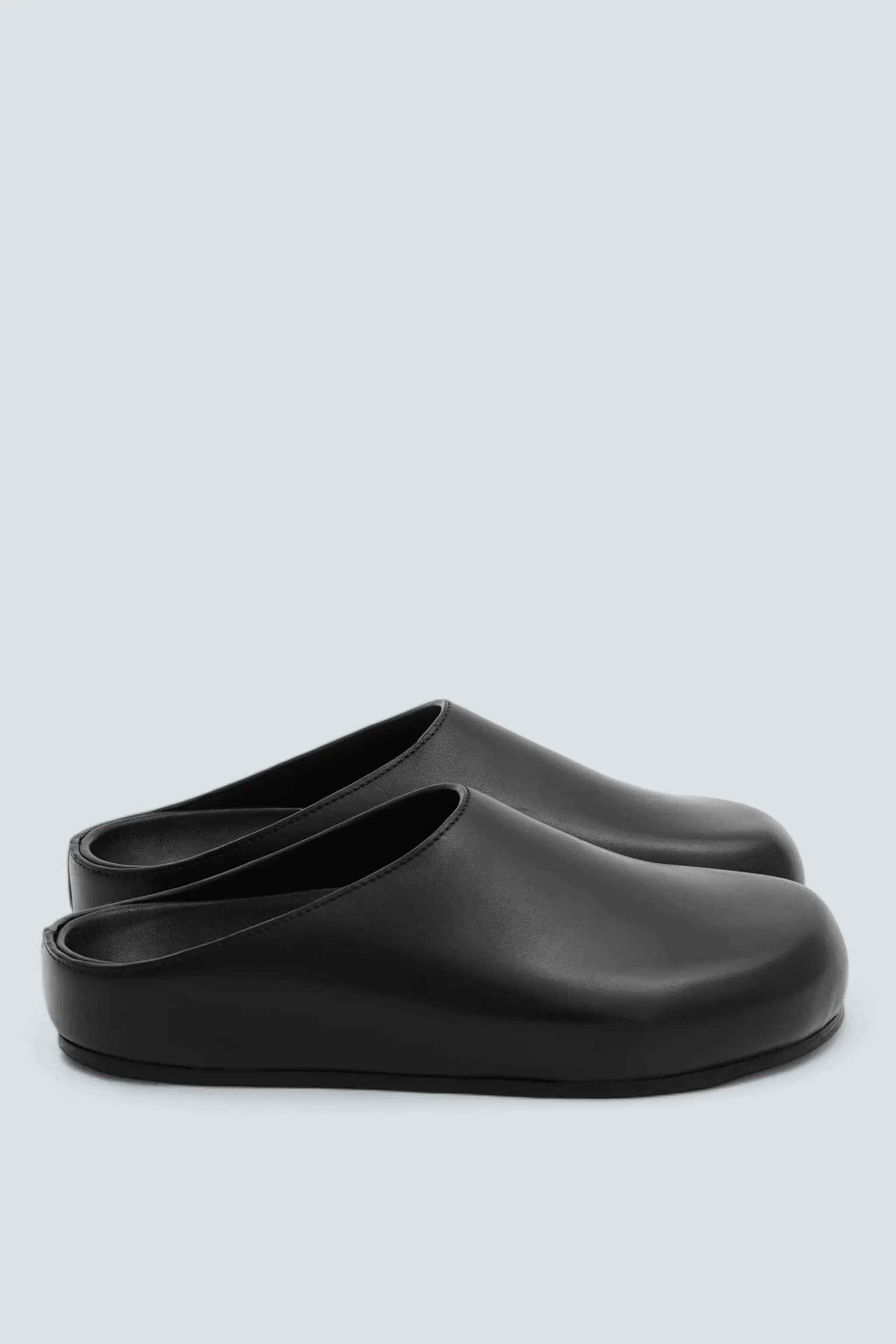Black M Wearing Clog