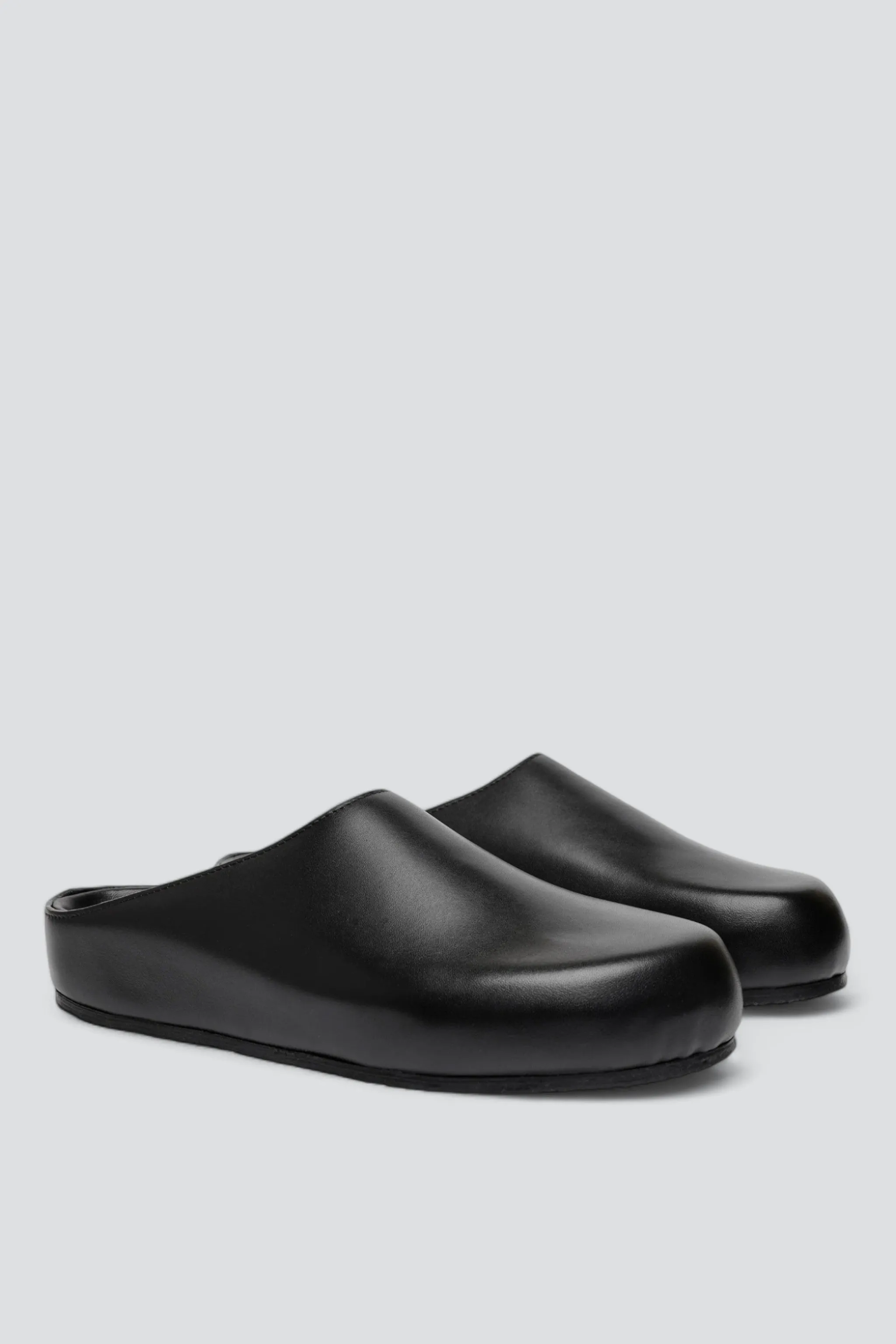 Black M Wearing Clog