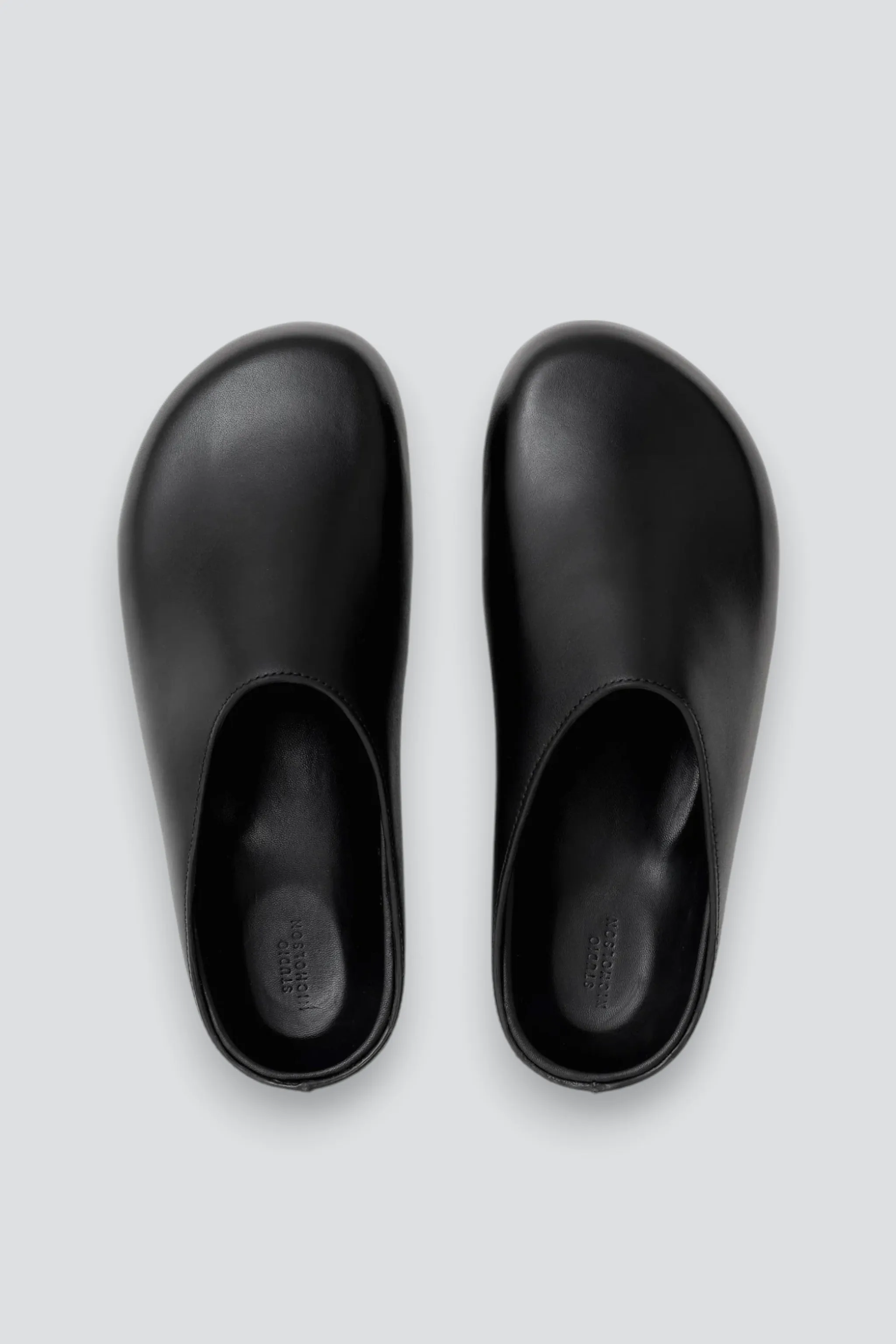 Black M Wearing Clog