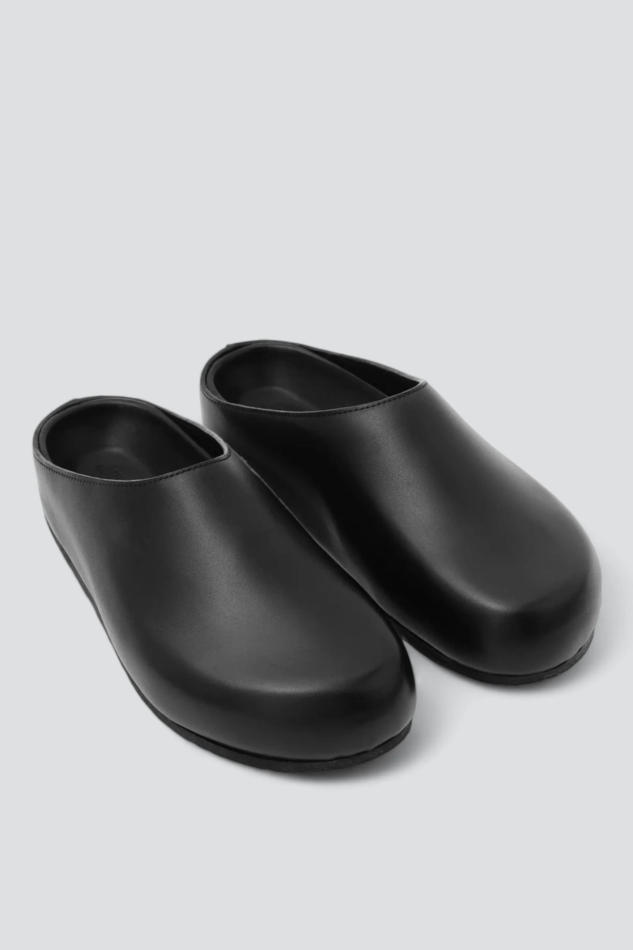 Black M Wearing Clog