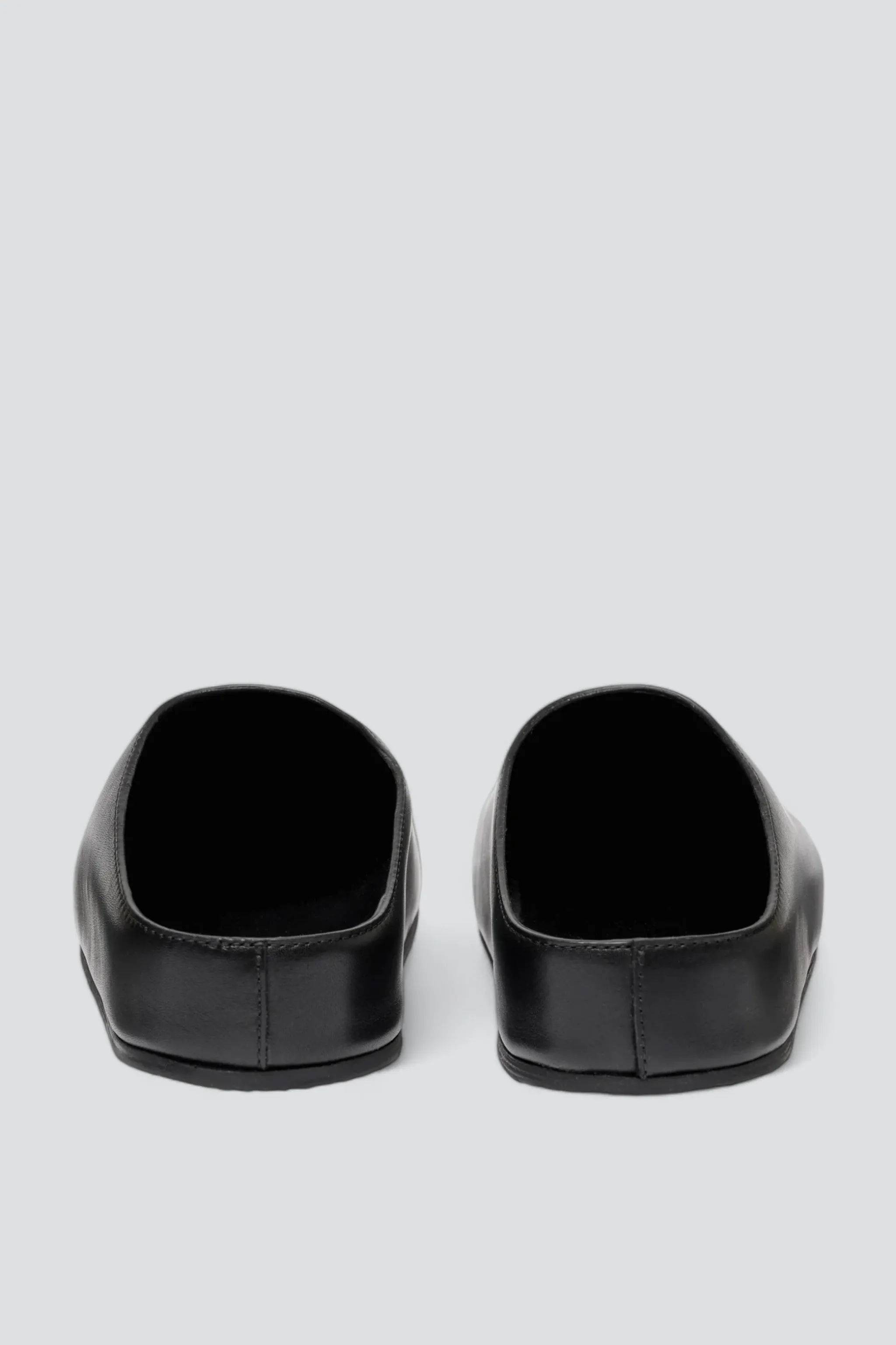 Black M Wearing Clog